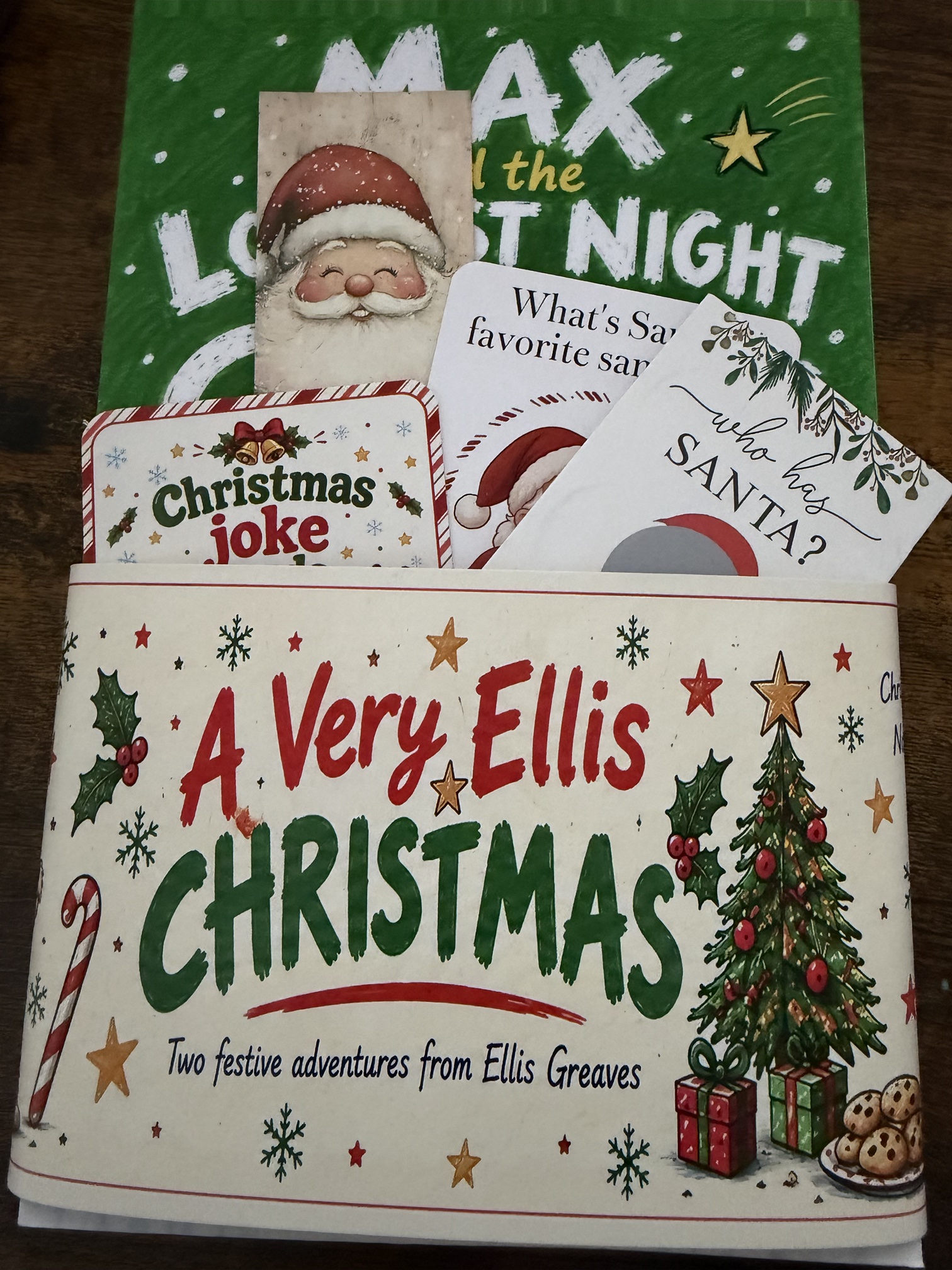 img 7182 img 7182A Very Ellis Christmas Book Bundle: two Ellis Greaves Christmas books with a bookmark, joke cards and scratch card in a festive belly band
